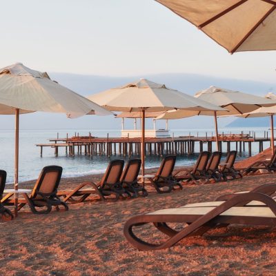 scenic-view-private-sandy-beach-beach-with-sun-beds-against-sea-mountains-amara-dolce-vita-luxury-hotel-resort-tekirova-kemer-turkey