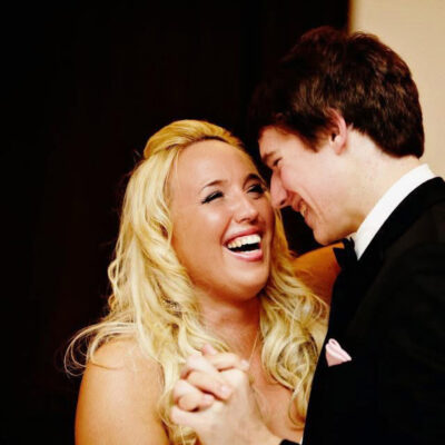 Andi laughing with her brother Alex during her wedding celebration in Buenos Aires, Argentina in Hotel Faena.